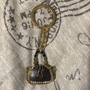 Unbranded Darling purse shaped bag charm. Or you can use it as a key ring.